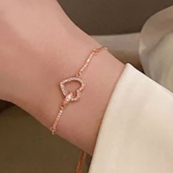 The Rose Gold Heart Chakra Slide Closure bracelet with heart pendant. - Picture 7 of 9